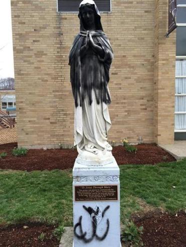 Vandalized statue at St Catherine of Siena parish in Norwood, MA. Photo credit: Archdiocese of Boston